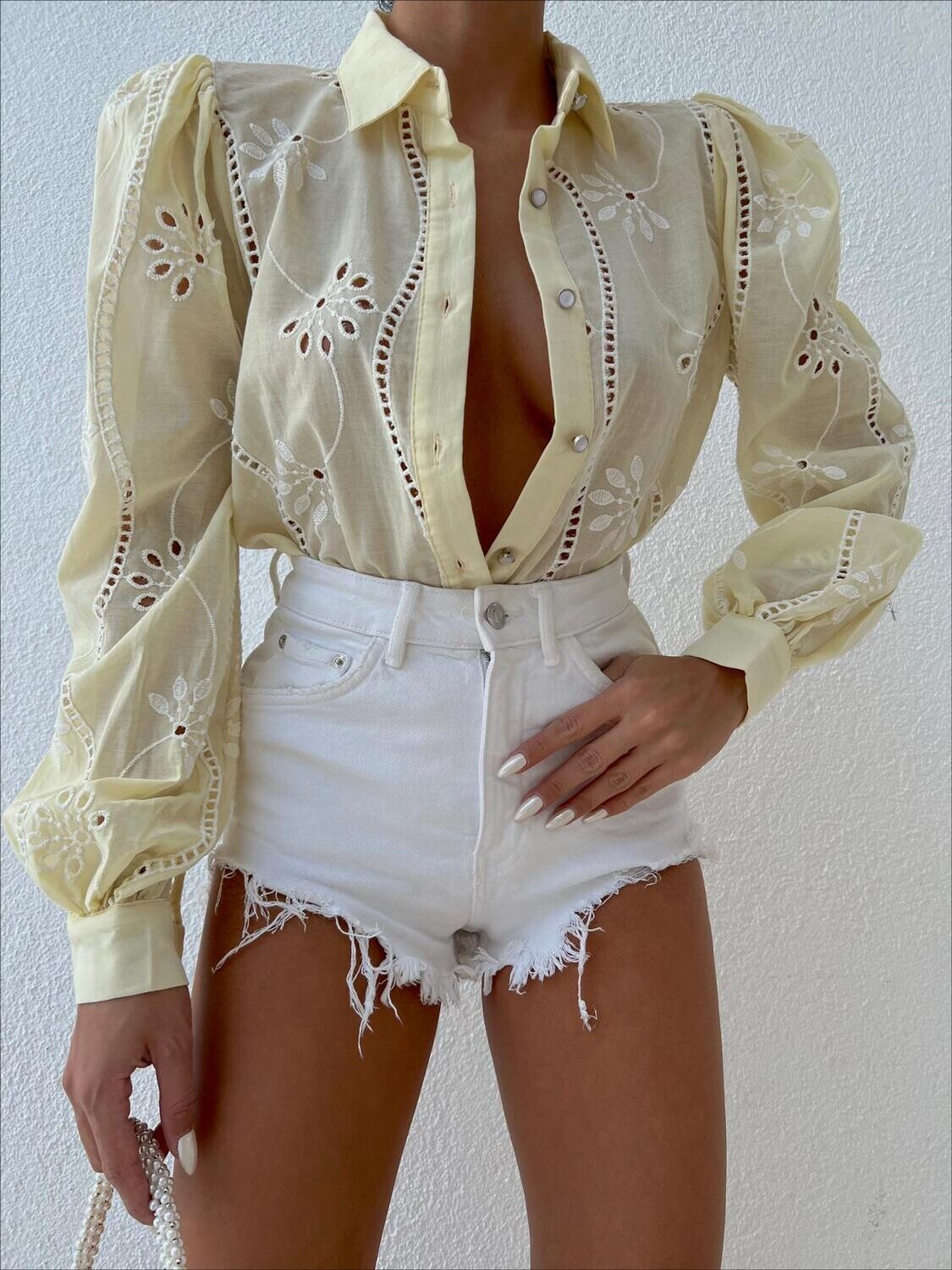 Light yellow shirt with lock embroidery